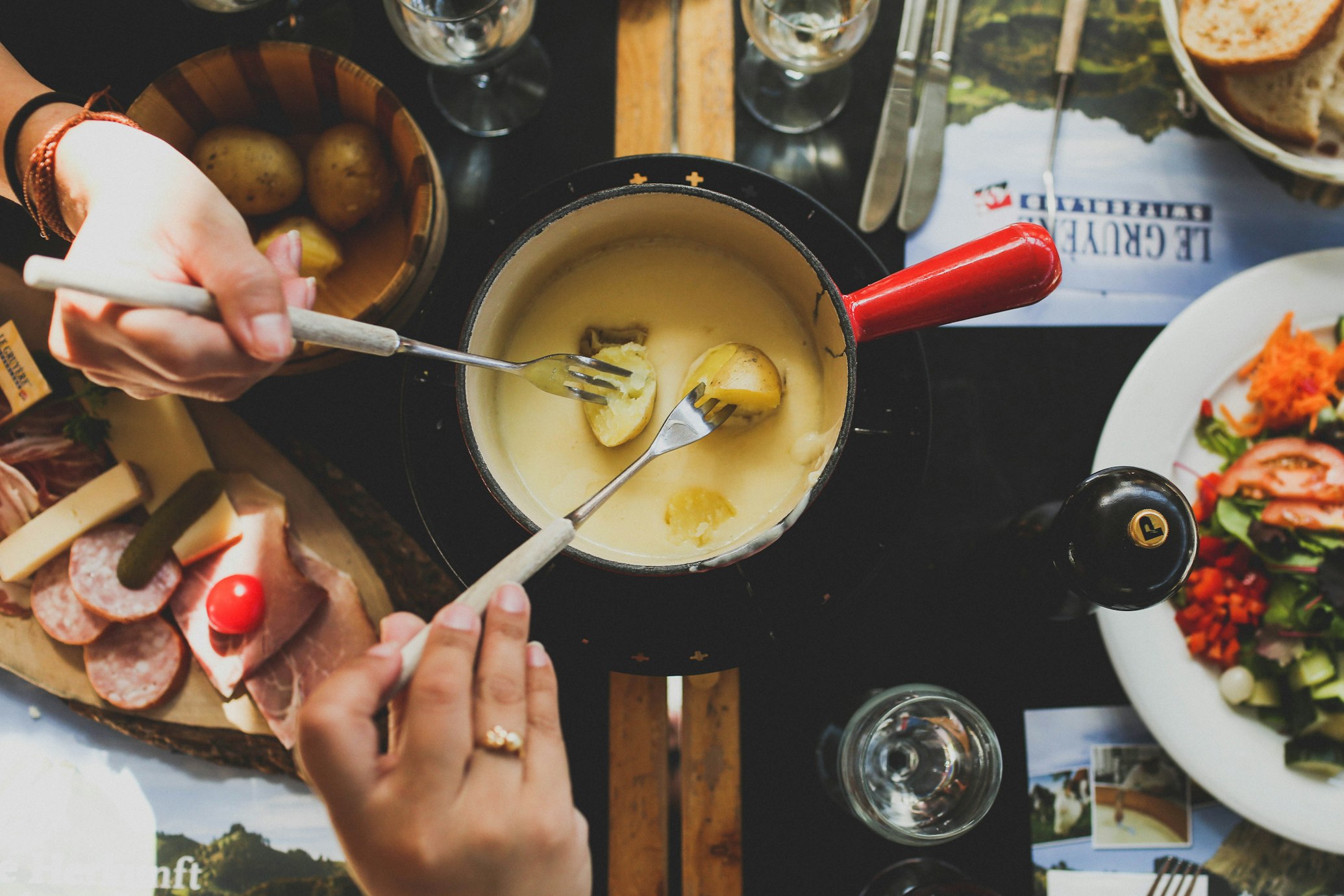 fondue. Photo by angela pham, Zermatt’s Cuisine: Indulge In Rich, Authentic Swiss Traditions